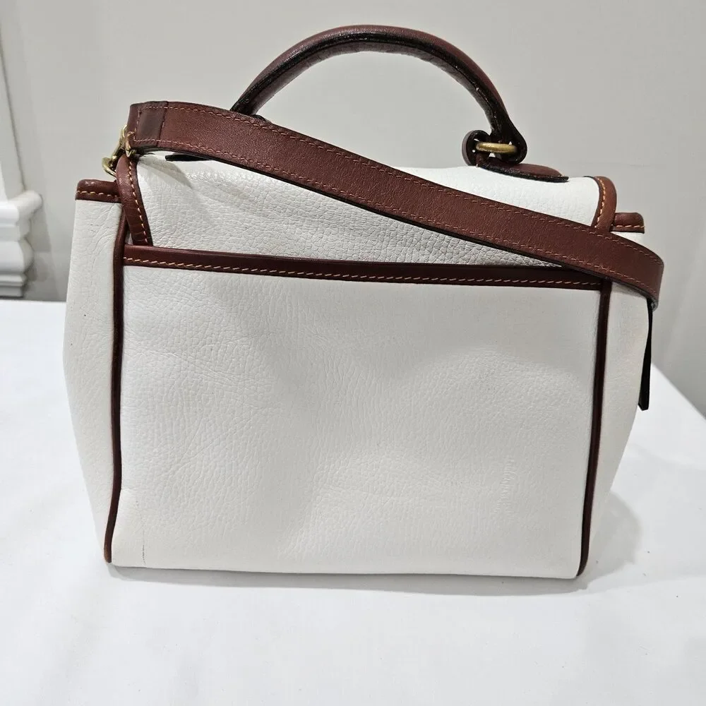 Coach tags accent business